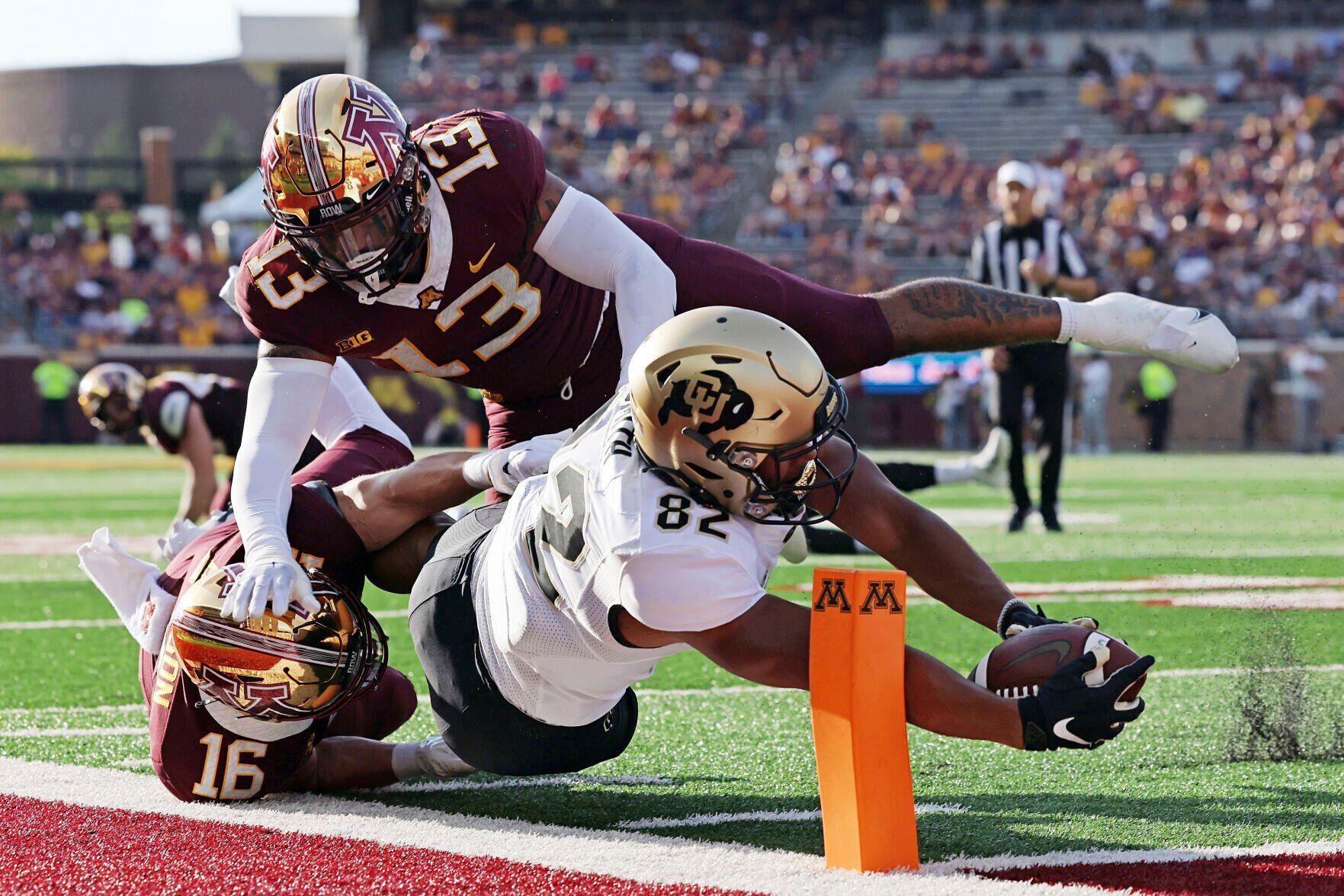 APTOPIX Colorado Minnesota Football